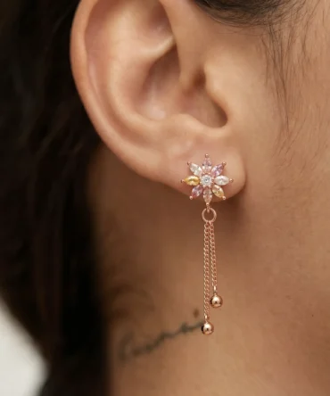 Rose gold plated floral tassel earrings with diamond finish crystals and pastel stones for women