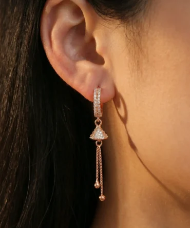 Rose gold plated tassel earrings with diamond finish crystals and cone drop design for women
