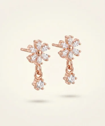Rose gold plated floral earrings with diamond finish crystals and small drop charm for women