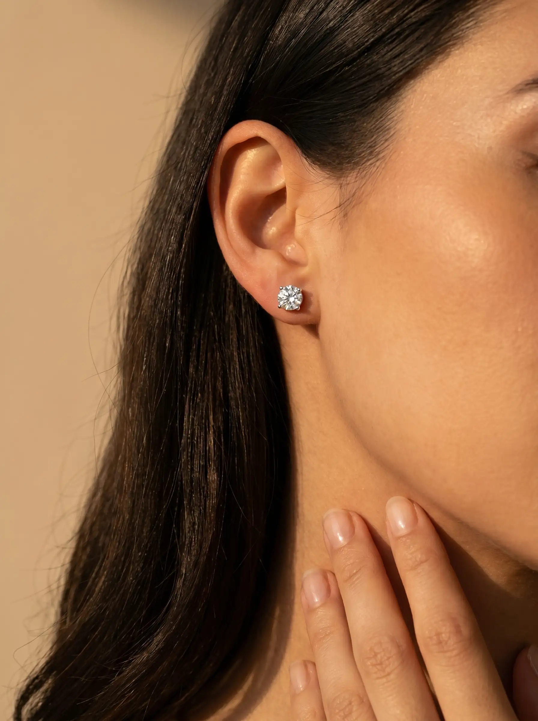 Silver tone solitaire stud earrings with round crystal and multi prong setting for women