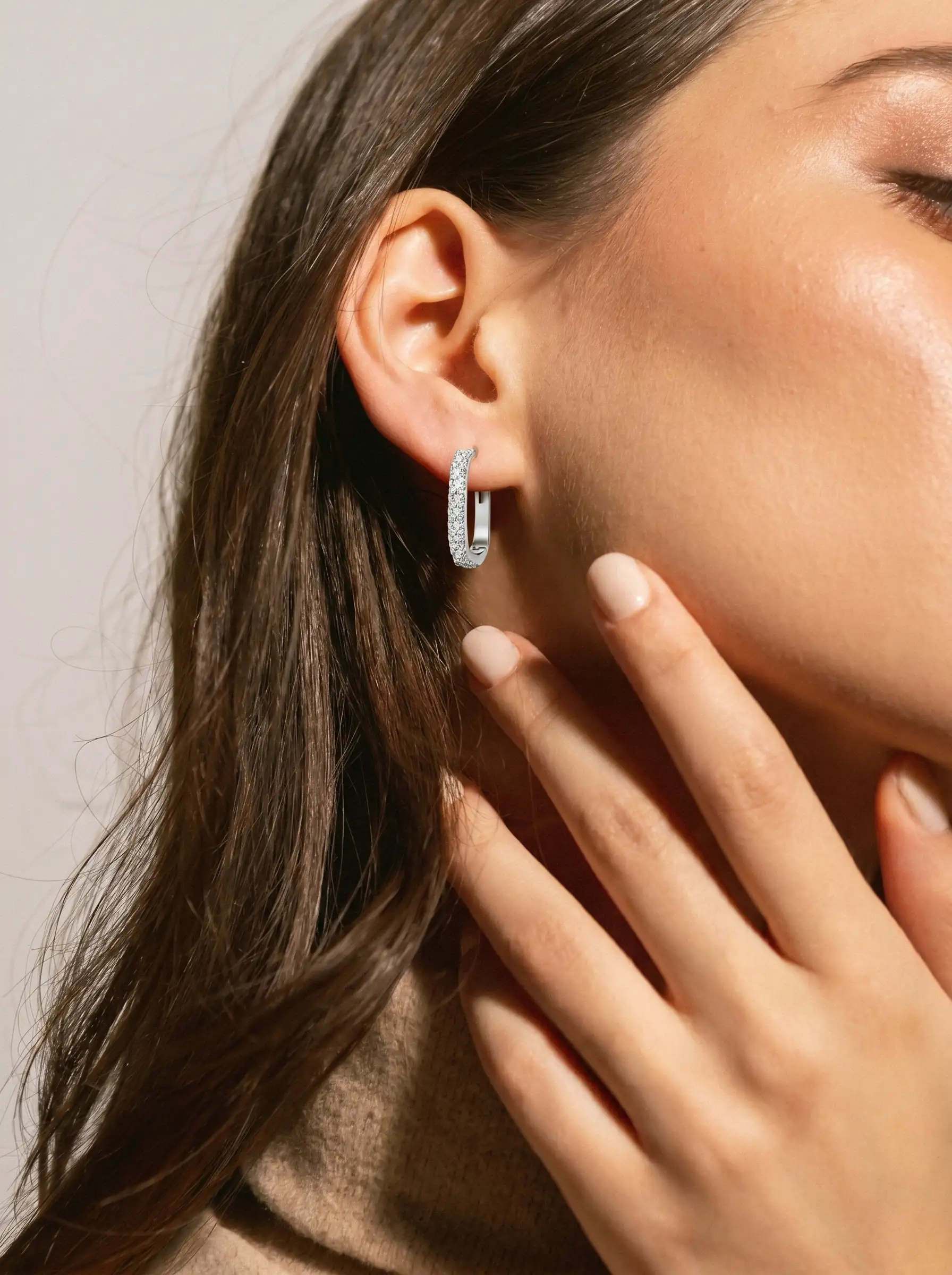 Silver tone geometric hoop earrings with crystal studded front design for women