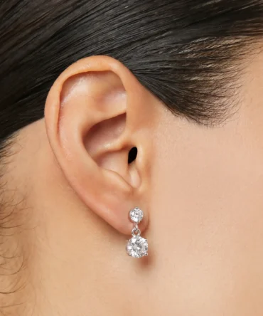 Silver tone double drop earrings with round crystal solitaire design for women