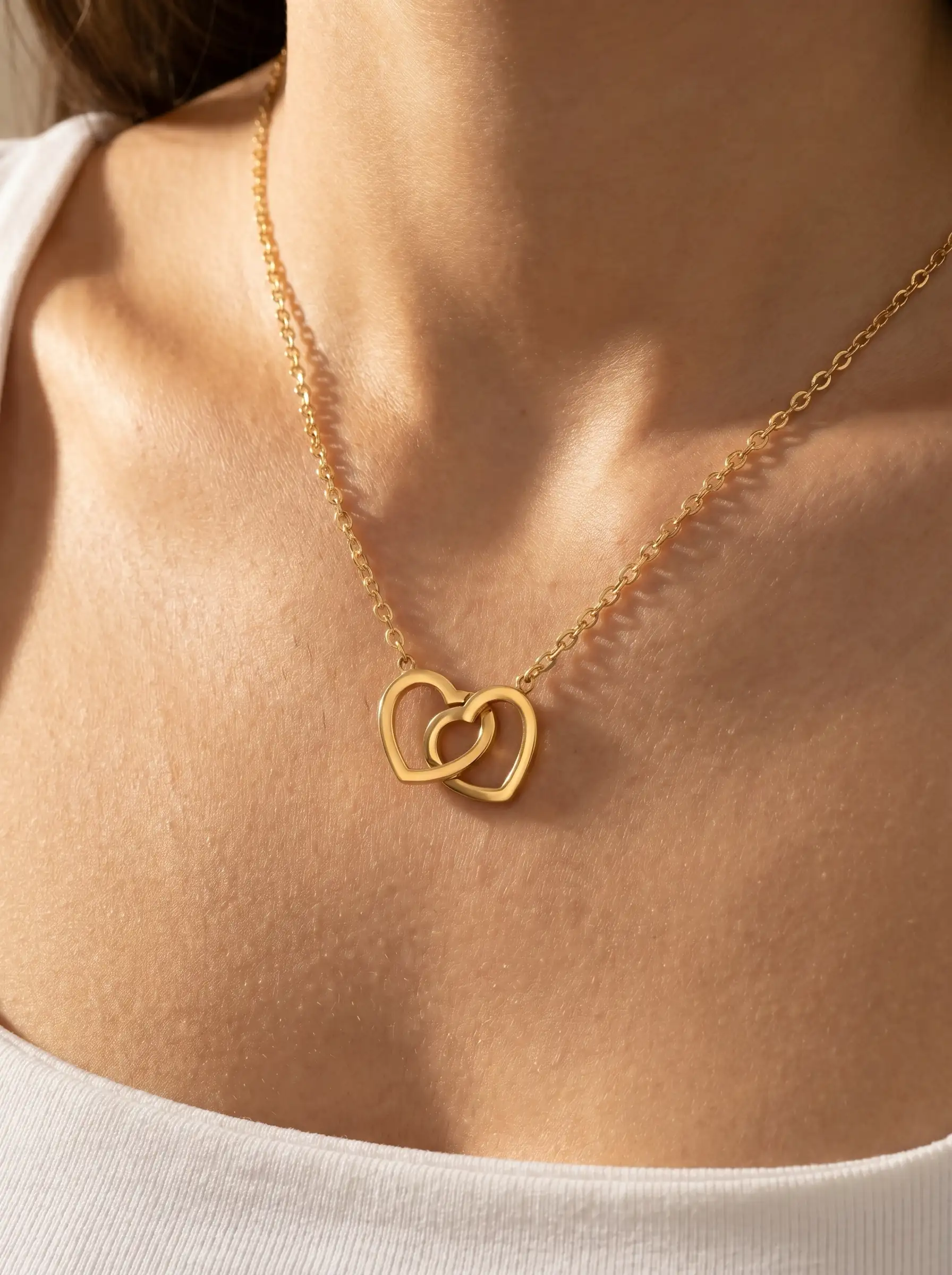 Gold plated double heart pendant necklace on fine chain for women