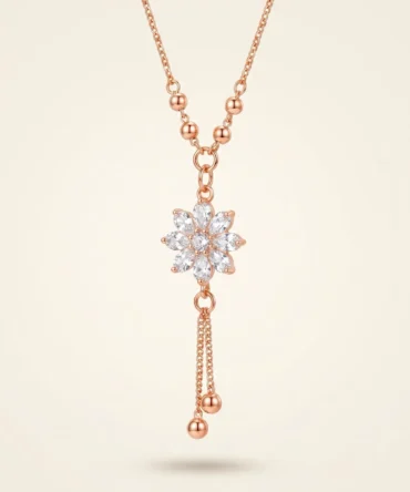 Rose gold plated floral necklace with diamond finish crystals and drop tassel chain for women