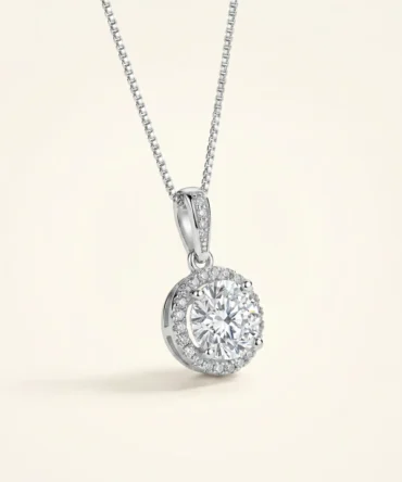 Silver tone circular solitaire pendant with crystal halo setting on chain for women