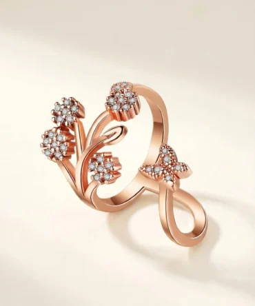 Rose gold plated floral adjustable ring with American diamond detailing for women