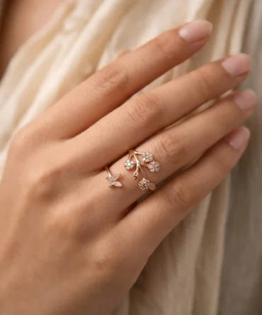Rose gold plated floral adjustable ring with American diamond detailing for women