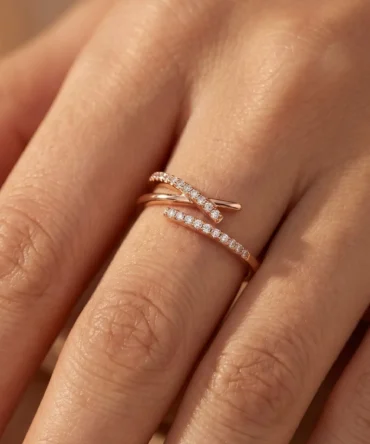 Rose gold plated adjustable crossover ring with American diamond detailing for women