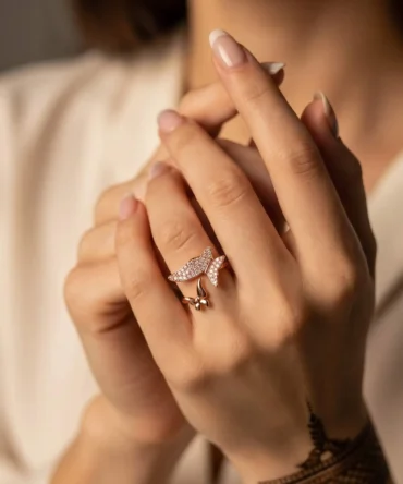Rose gold plated butterfly finger ring with American diamond detailing for women