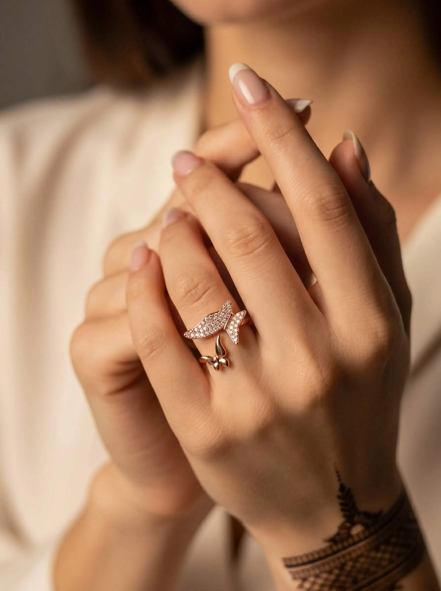 Rose gold plated butterfly finger ring with American diamond detailing for women