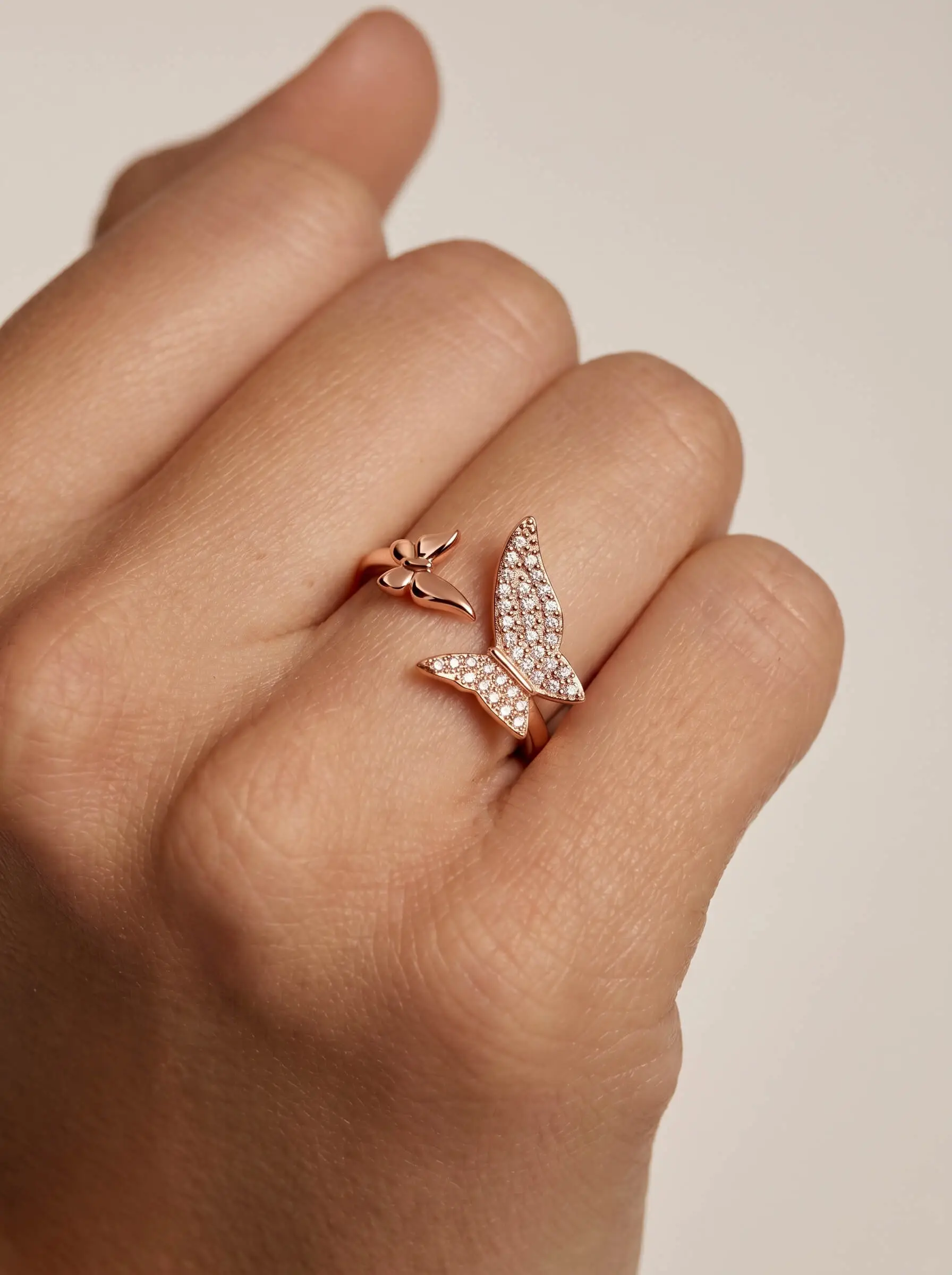 Rose gold plated butterfly finger ring with American diamond detailing for women