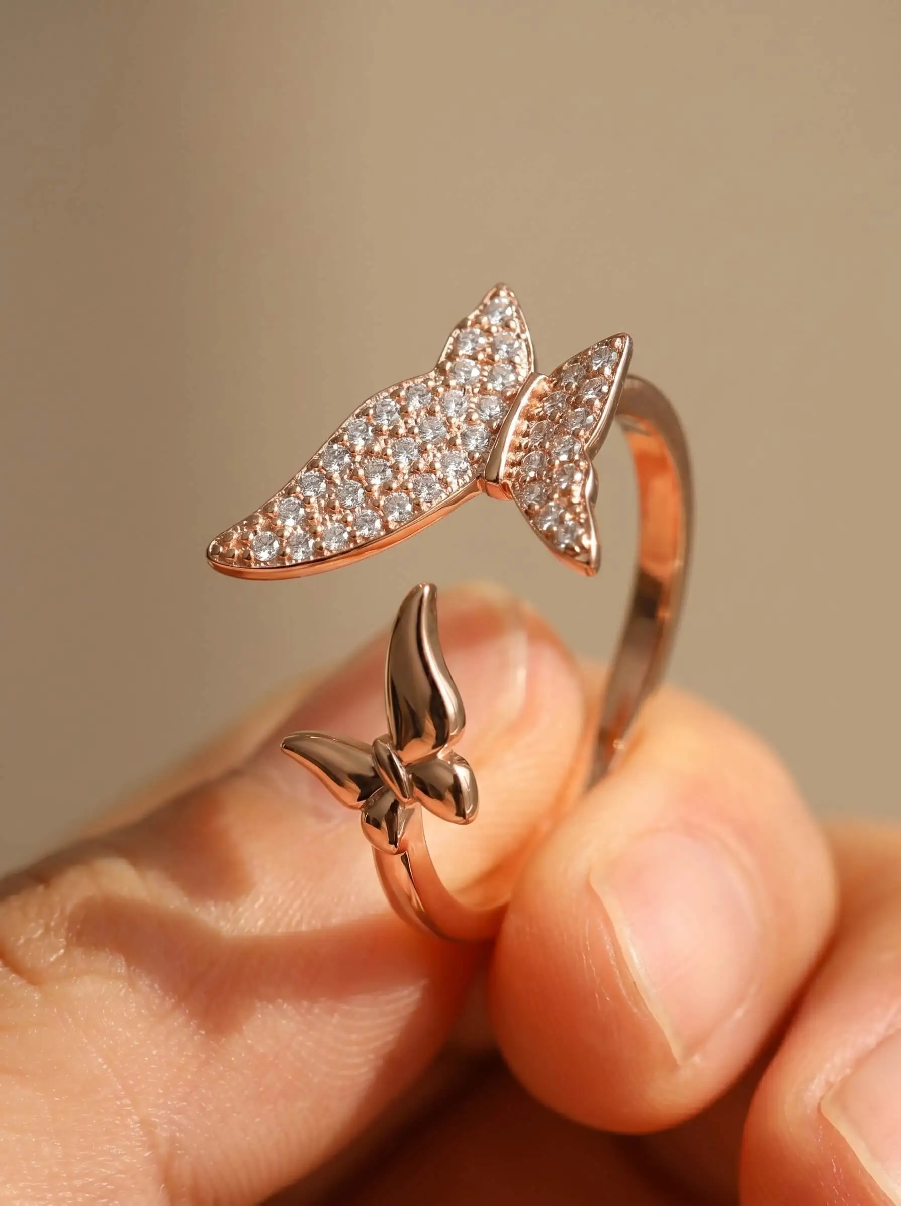 Rose gold plated butterfly finger ring with American diamond detailing for women
