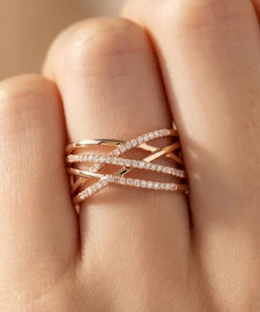 Rose gold plated contemporary crossover ring with crystal detailing for women