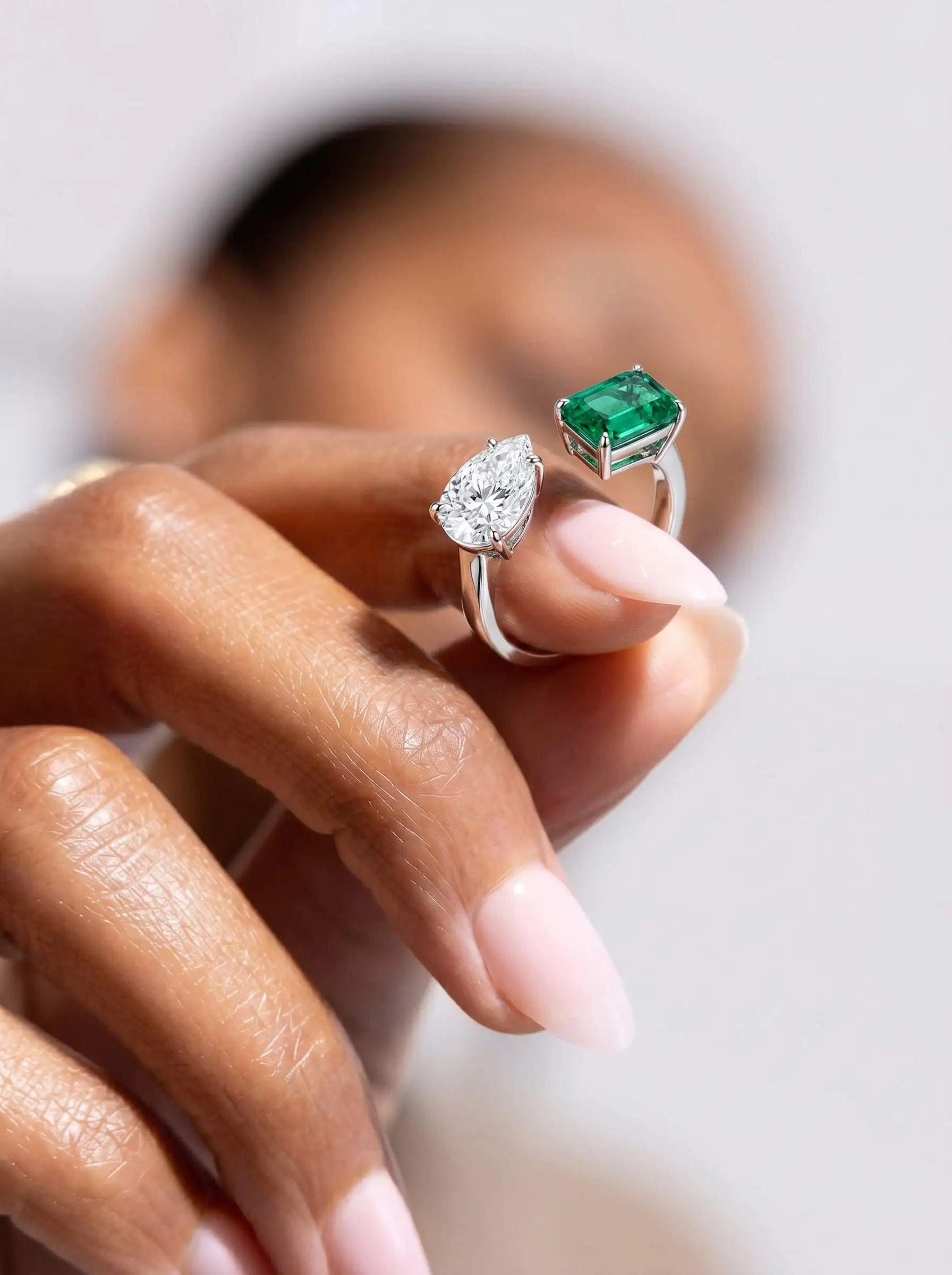 Silver plated anti tarnish ring with green rectangular stone and crushed ice crystal detailing for women